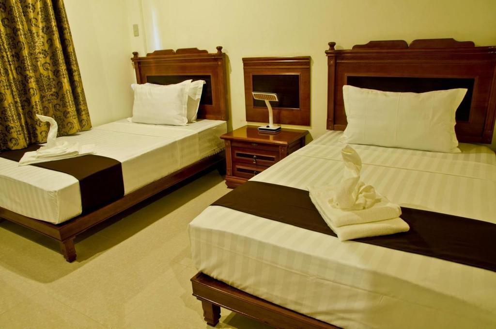 The Premiere Business Hotel Kalibo Habitación foto